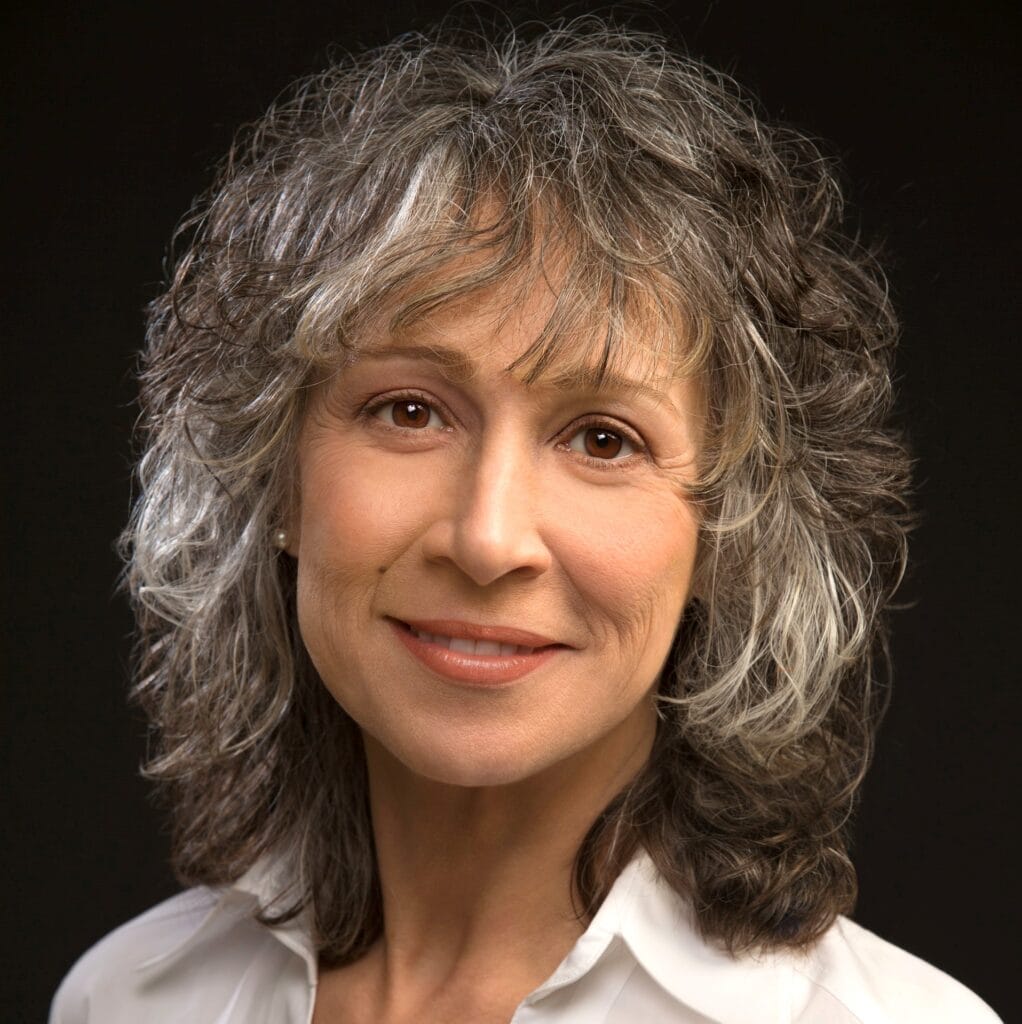 headshot of woman with gray hair