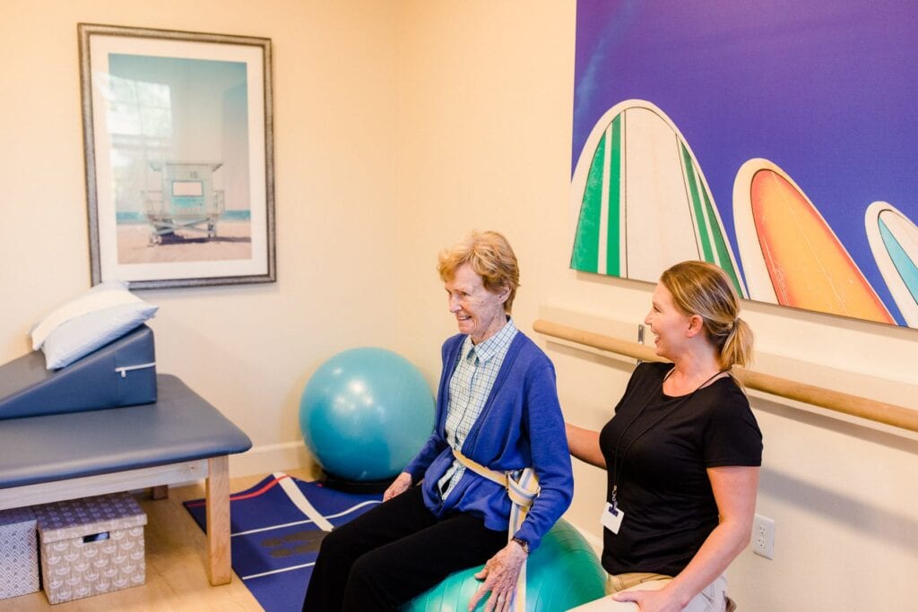 resident exercising in physical therapy