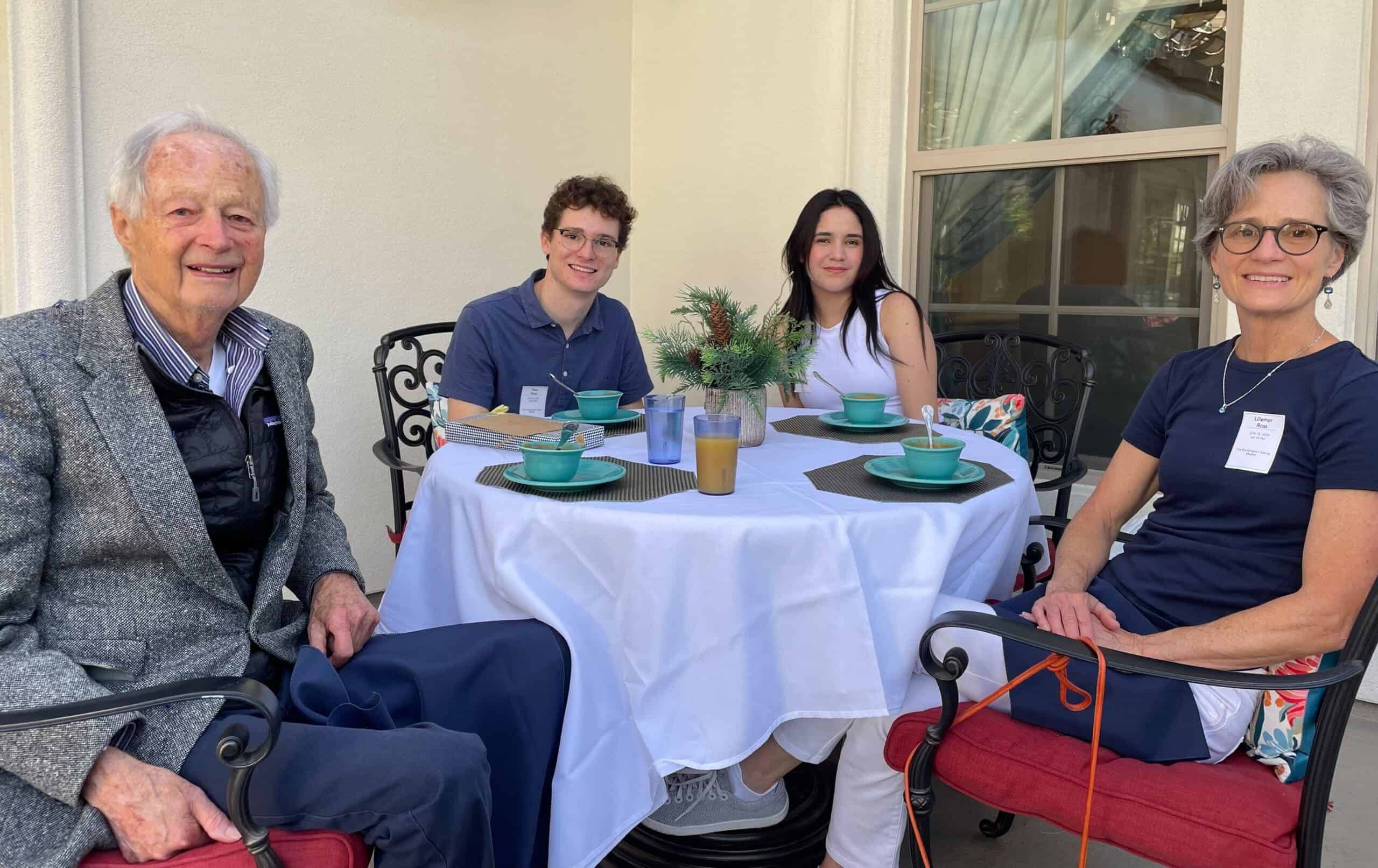 resident and family members dining together