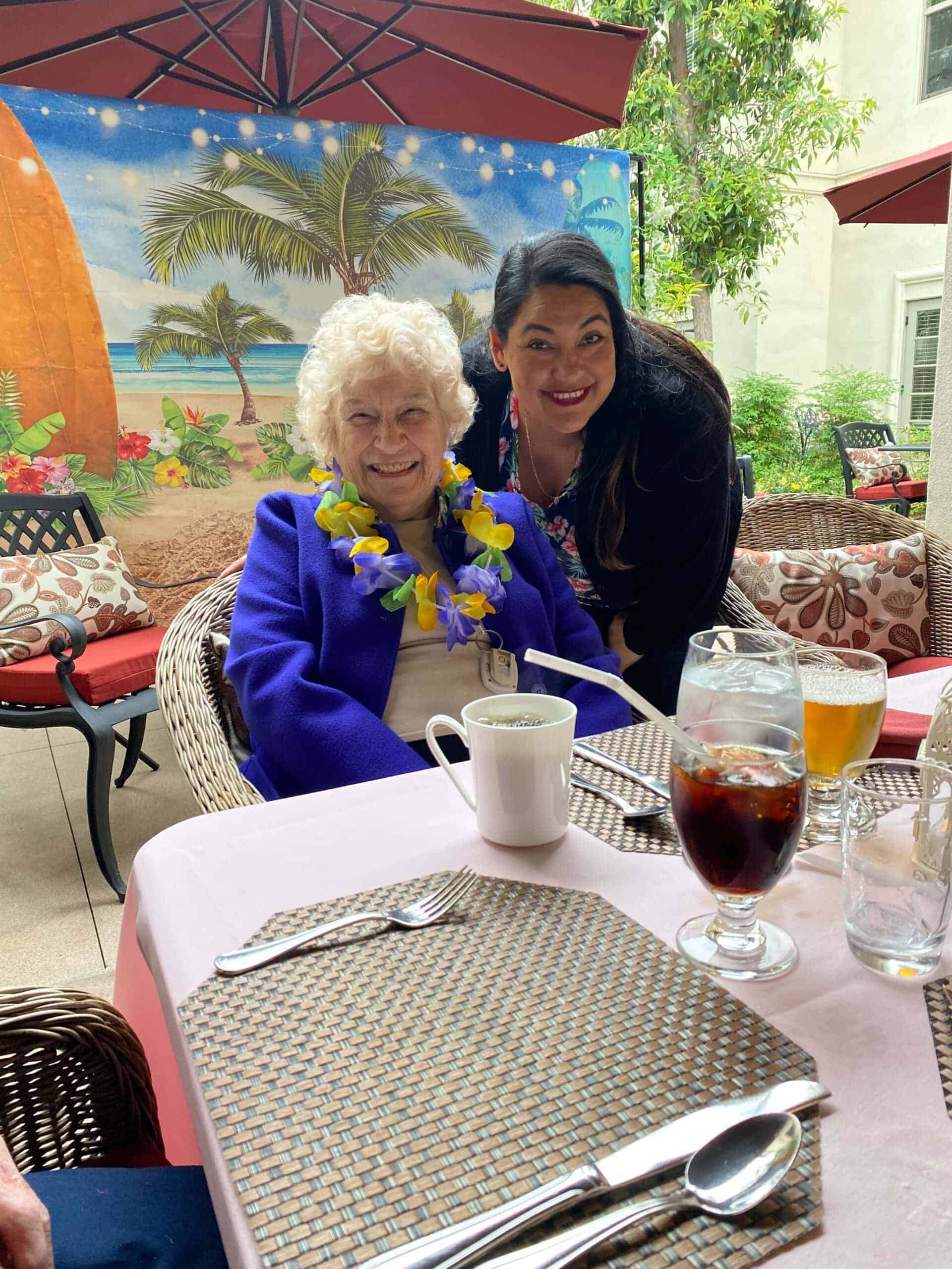 resident and team member during luau