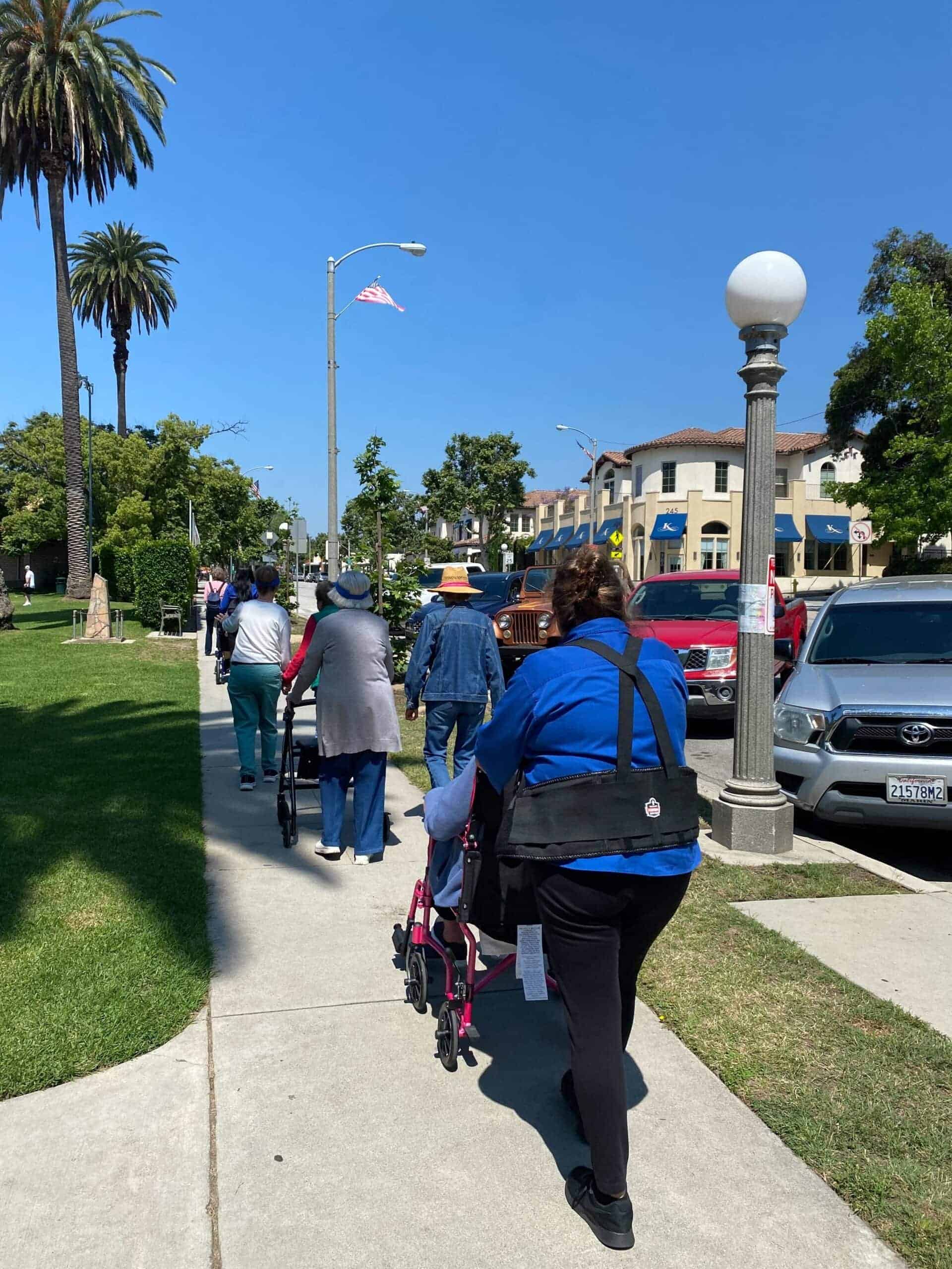 team members and residents walking together