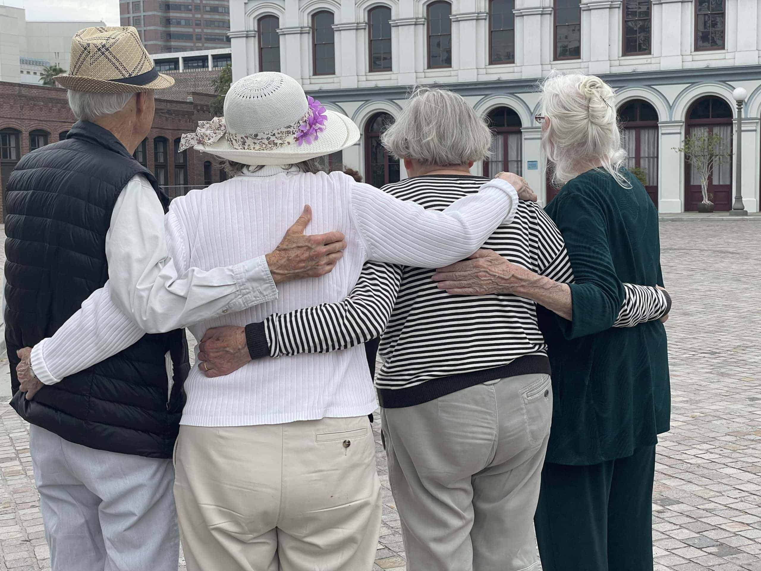 residents arm in arm