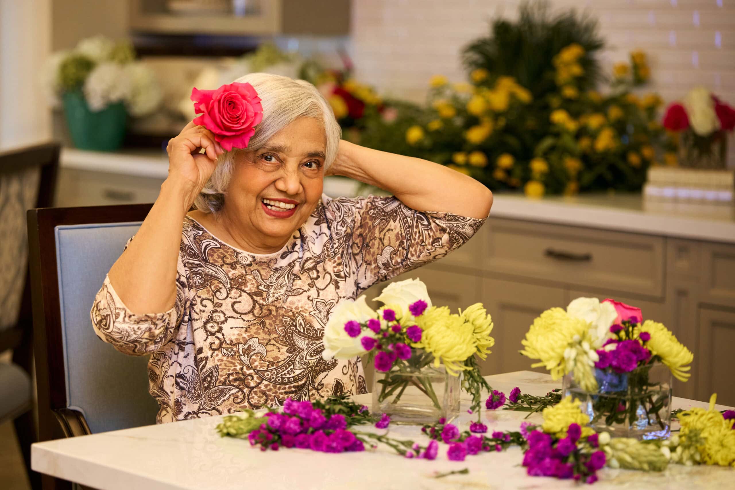 Senior lady working on flower arrengements